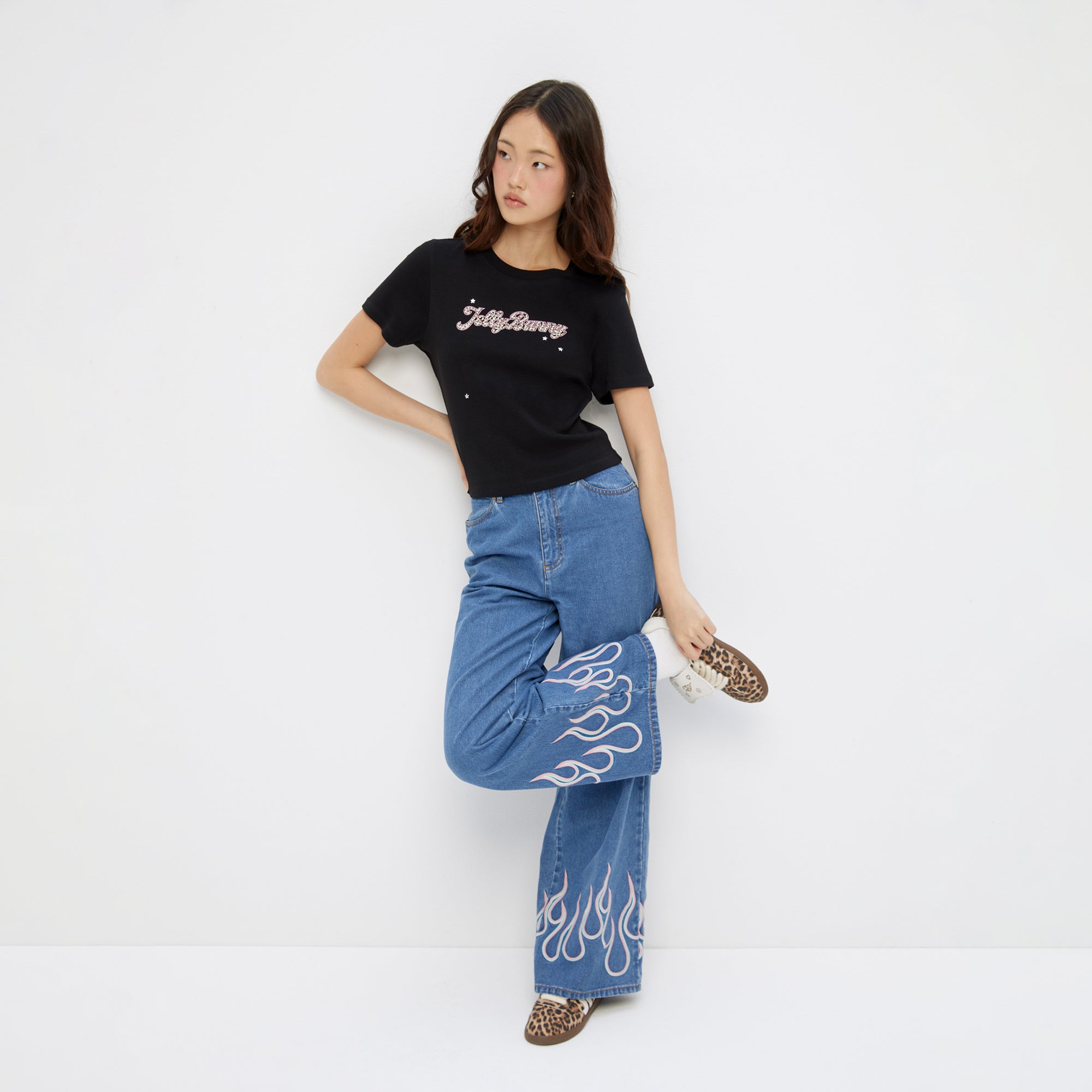 เสื้อยืดปักลายโลโก้ลวดลายเสือดาว Black