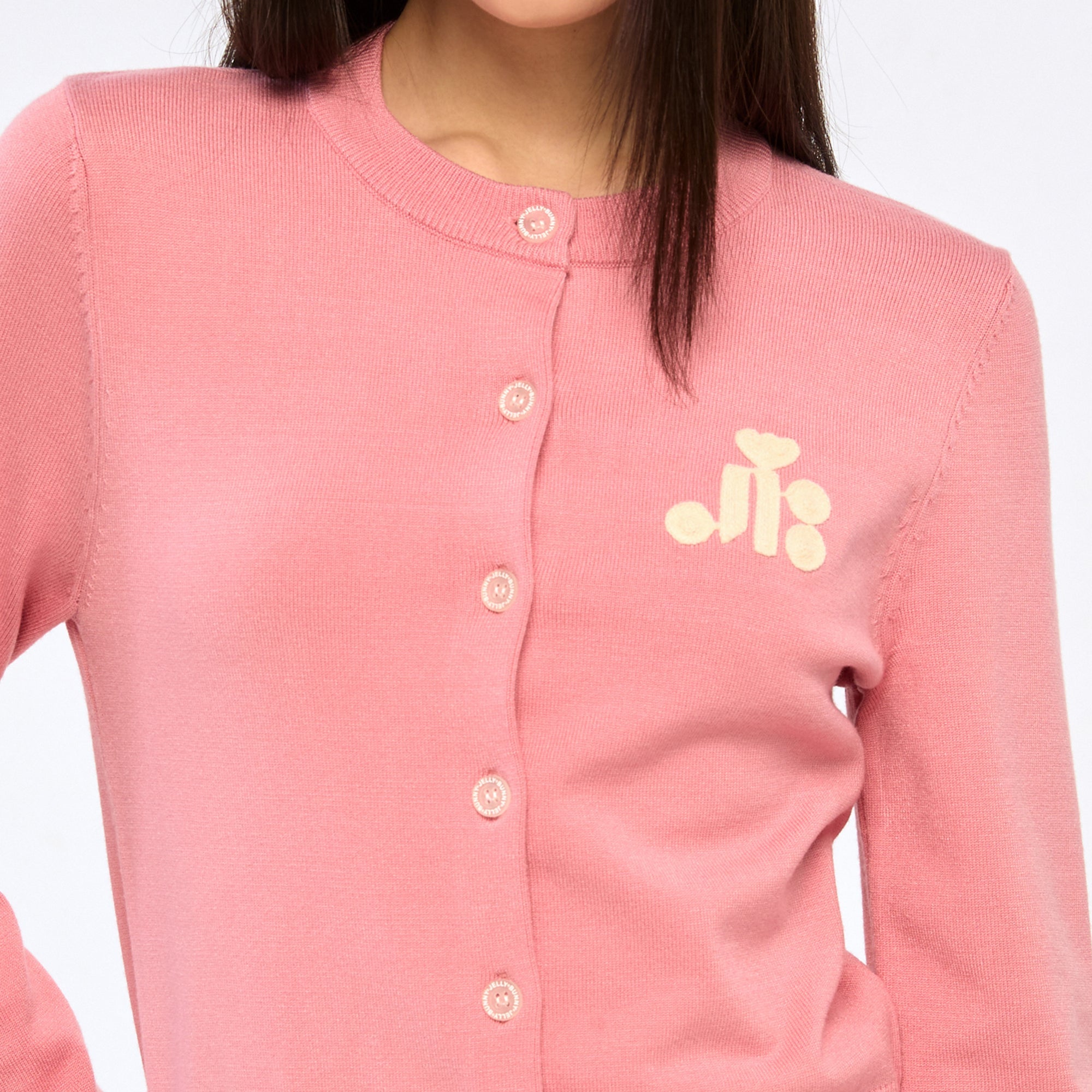 คาร์ดิแกนผ้านิตปักโลโก้ Pink