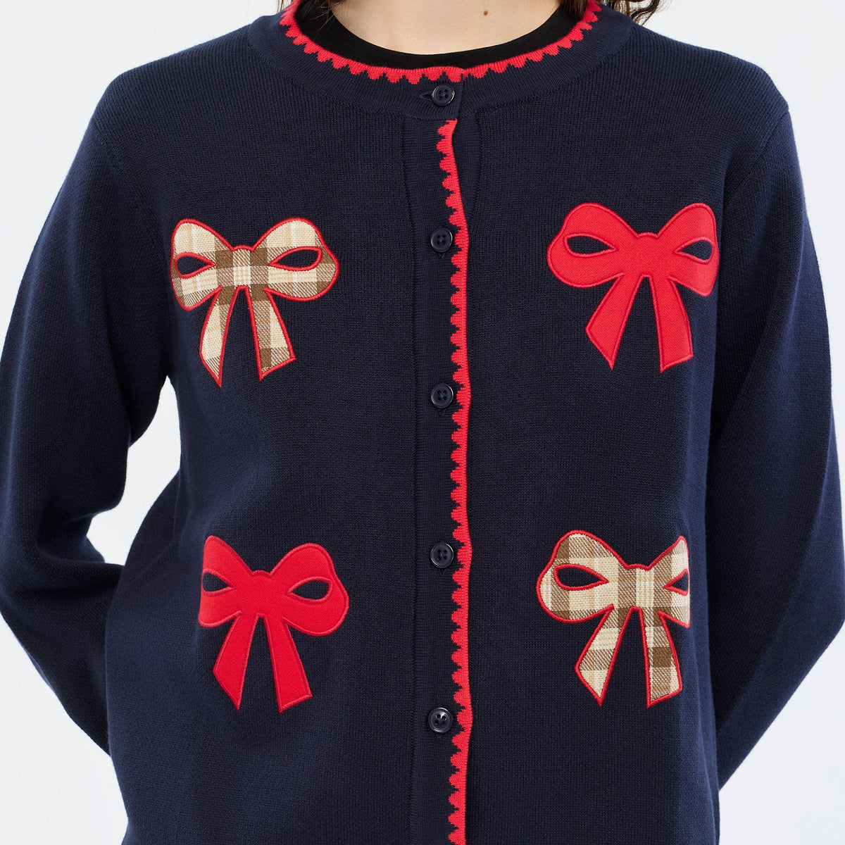 เสื้อคาร์ดิแกนแขนยาวลายโบว์ Navy