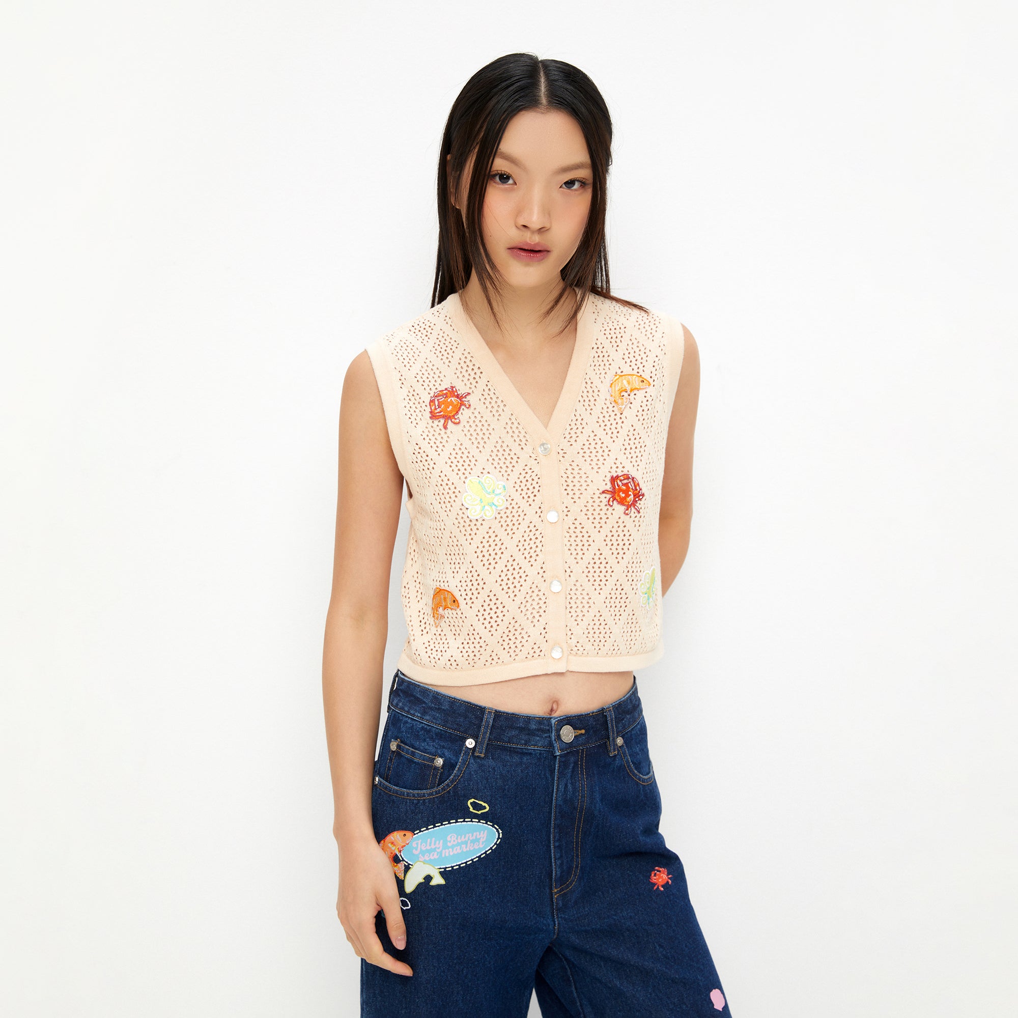 เสื้อนิตแขนกุดปักลายสัตว์