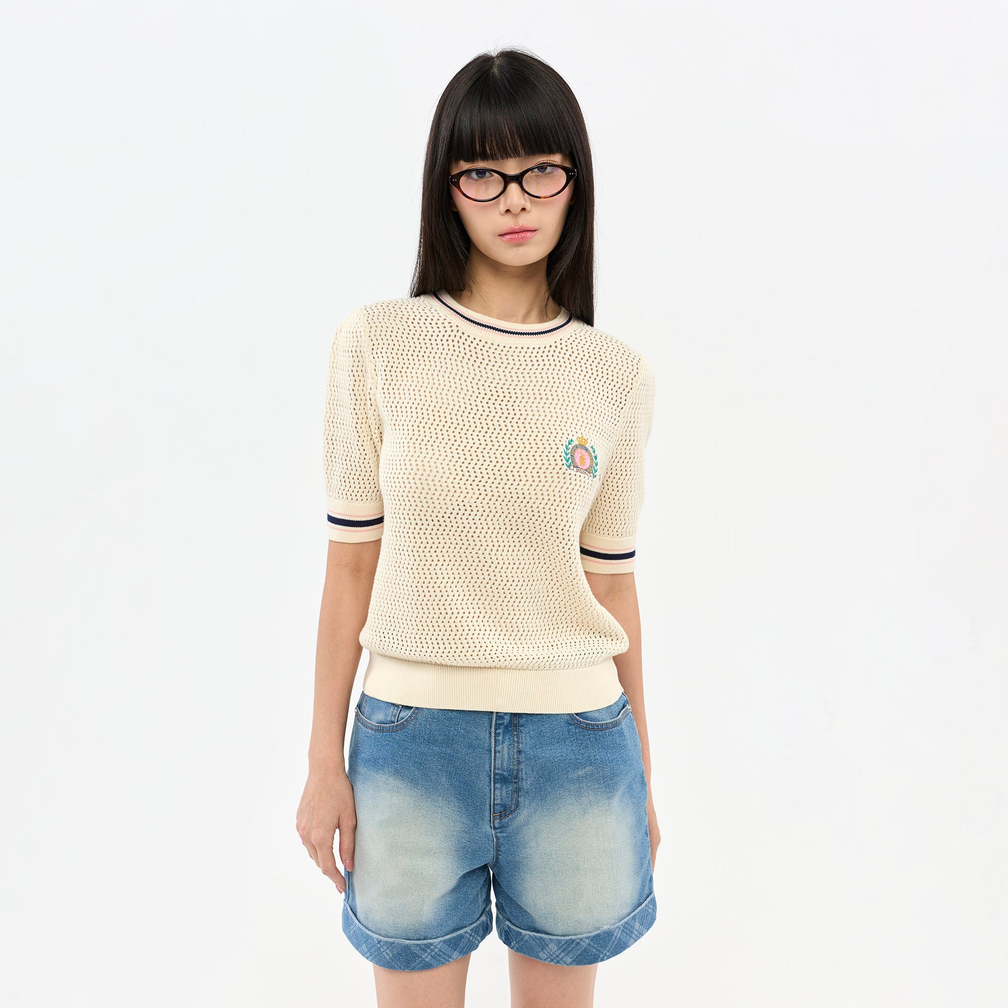 เสื้อถักแขนสั้นปักลาย Royal Club
 Cream