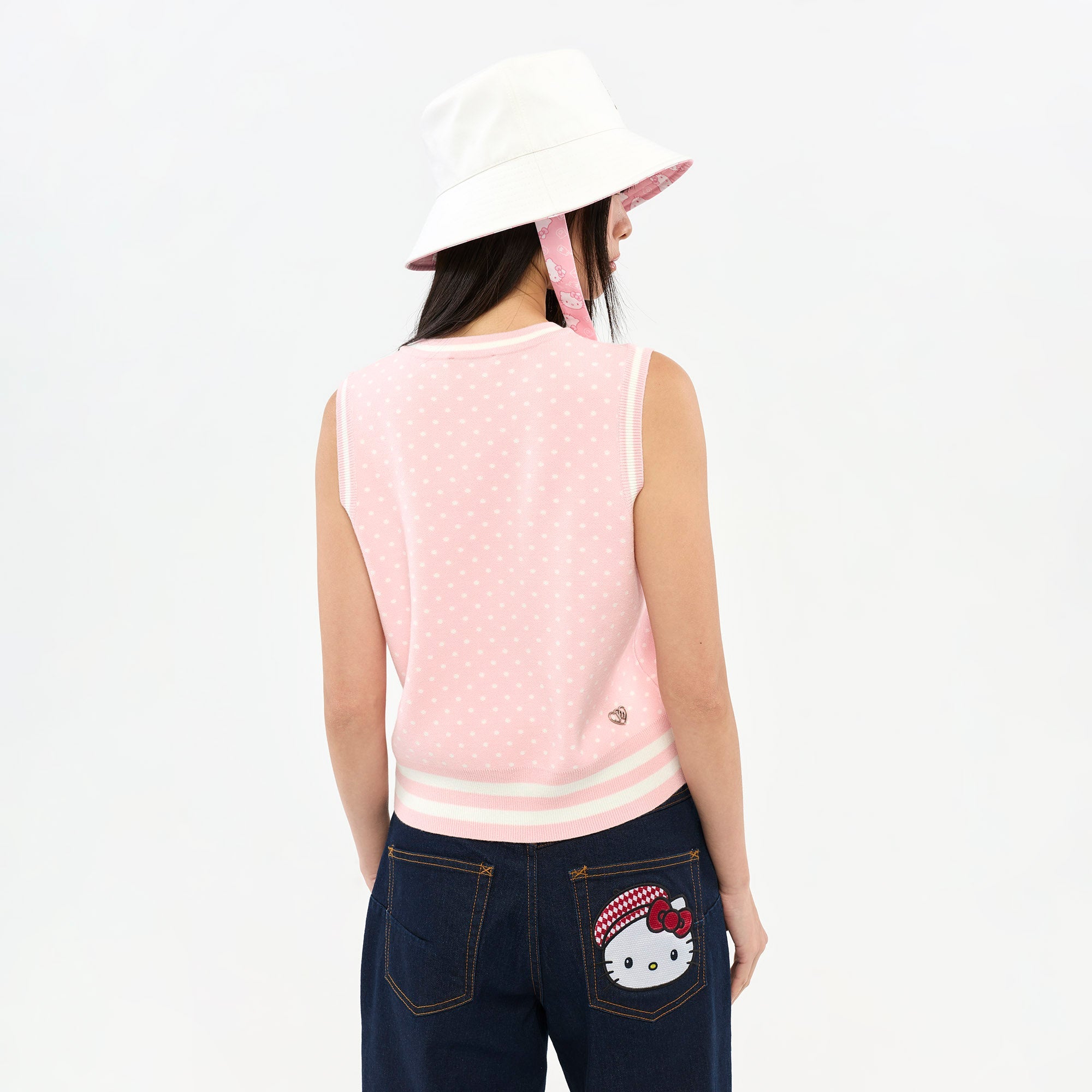 เสื้อกั๊กผ้าถักลายจุด Hello Kitty Pink