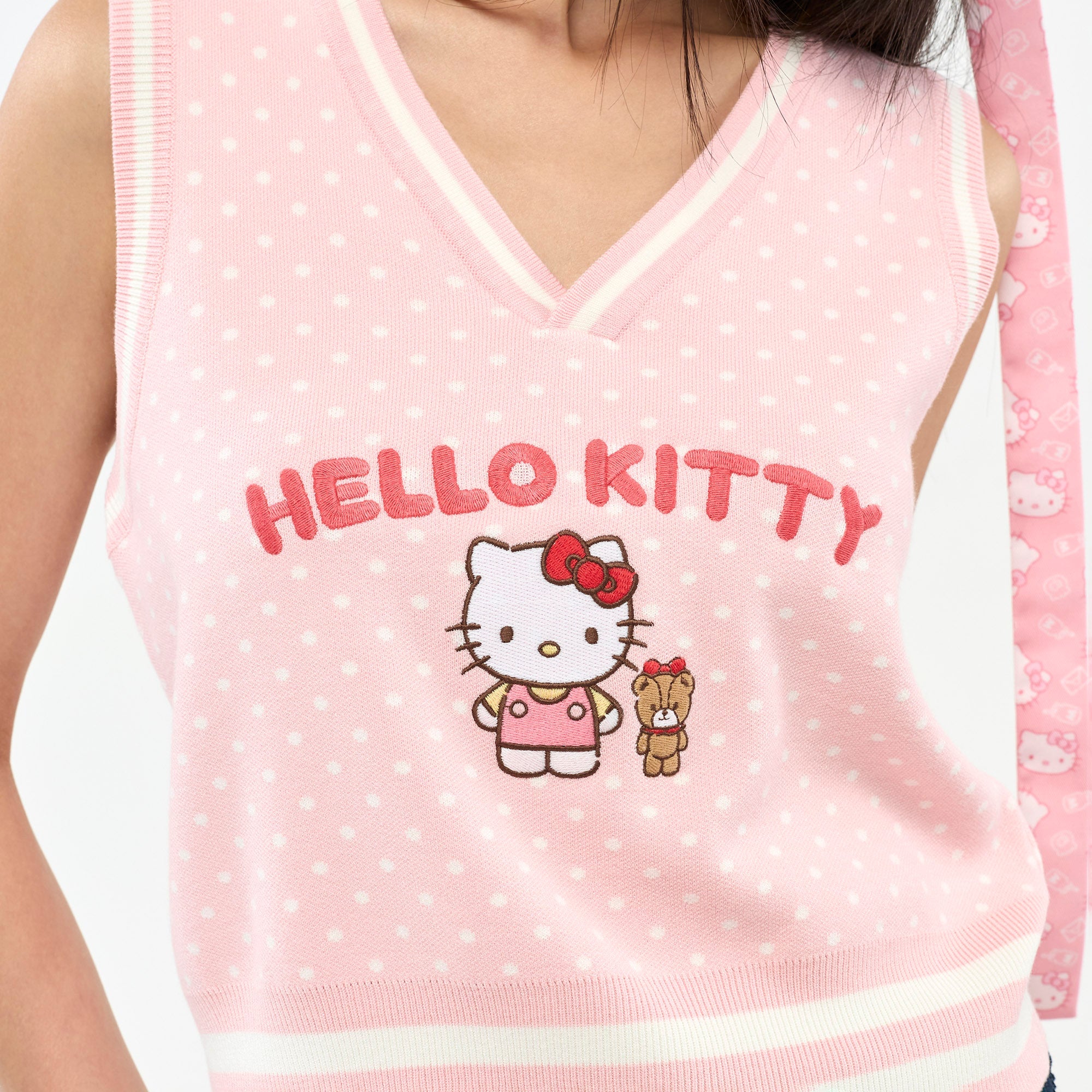 เสื้อกั๊กผ้าถักลายจุด Hello Kitty Pink