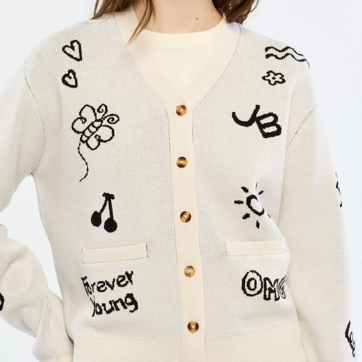 เสื้อคาร์ดิแกนลายกราฟิก Jeremy Cream