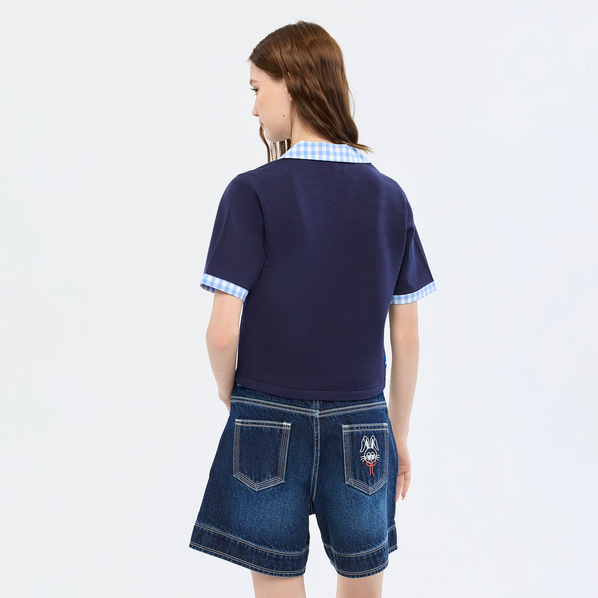 เสื้อโปโลแขนสั้นแต่งขอบลายตาราง Navy